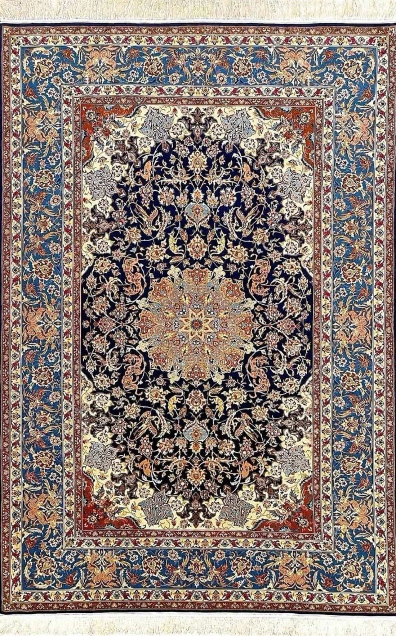 Vintage Persian rug handmade in Isfahan, featuring a traditional medallion design.